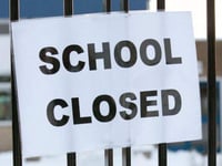 Schools closed as snow and ice strikes