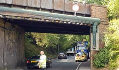 A325 blocked in Wrecclesham after lorry's hydraulic arm smashes into railway bridge