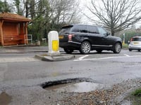 Councils face funding cuts over pothole repairs