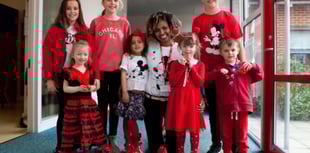 Children go red on catwalk for Comic Relief