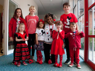 Children go red on catwalk for Comic Relief