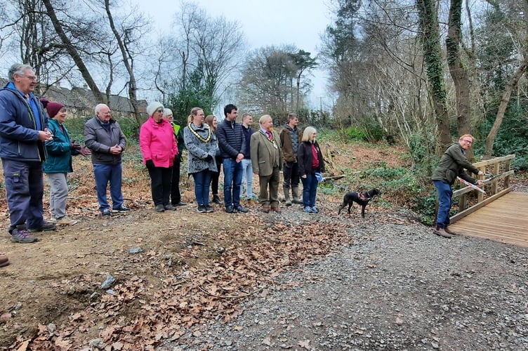 The 5th Earl of Selborne, William Palmer, dedicates the Lady Anne Brewis Bridge in Bordon’s Deadwater Valley Nature Reserve, February 2022.