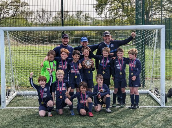 Back row: Ryan Harrison (assistant coach), Steve Ashby (head coach) and Dan Humm (assistant coach). Middle row: Henry Gunner, Matty Humm, Arthur Wholey, Harry Suntokeesing (captain), Jake Easter, Freddie Glover and Thomas Smith. Front row: Jed Kay, William Jennings, Roy Ashby and Jacob Harrison