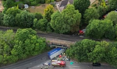Woman safely rescued from car crushed by HGV at Wrecclesham bridge