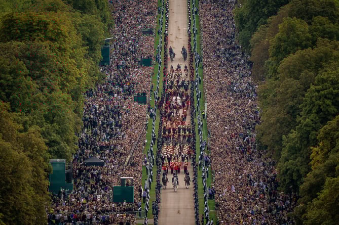 The Ceremonial Procession of the coffin of Queen Elizabeth II travels down the Long Walk as it arrives at Windsor Castle for the Committal Service at St George's Chapel. Picture date: Monday September 19, 2022.