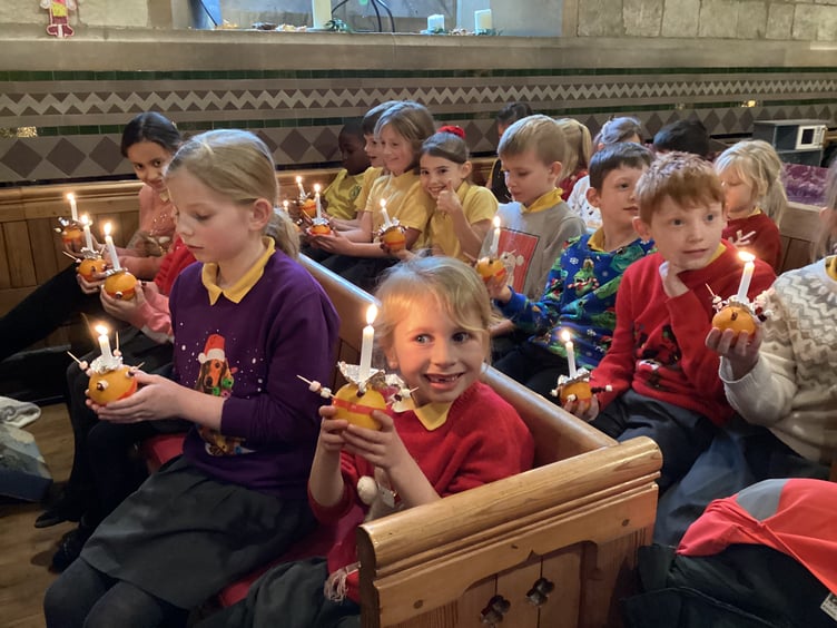 St Matthew's CE Primary School Christingle service, St Matthew's Church, Blackmoor, December 2022.