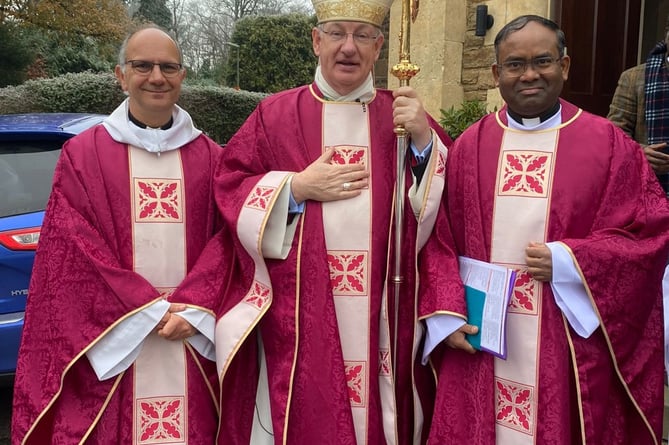 Bishop Richard with Father Jonathan (left) and Father Rajesh (right) outside Our Lady of Lourdes church
