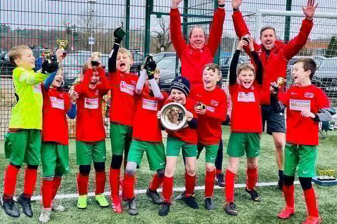 Chiddingfold Youth Chiefs under-tens celebrate winning the league plate