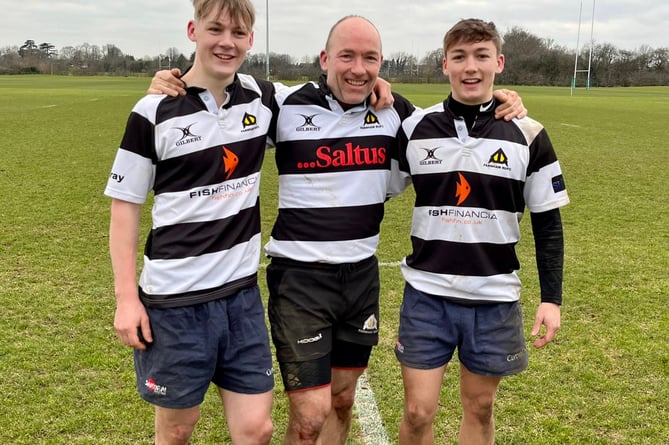 Farnham Vets’ stalwart Nick Purnell with sons James (left) and Tom. Nick scored one try and James two in the victory over London Irish Vets