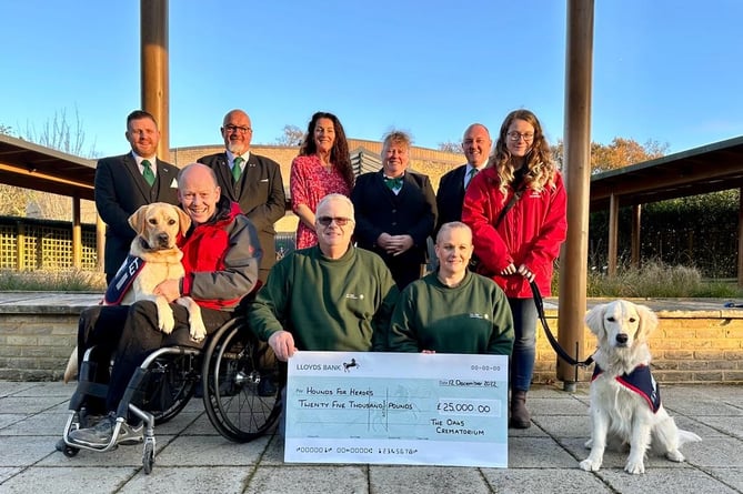 Hounds for Heroes receives the £25,000 cheque