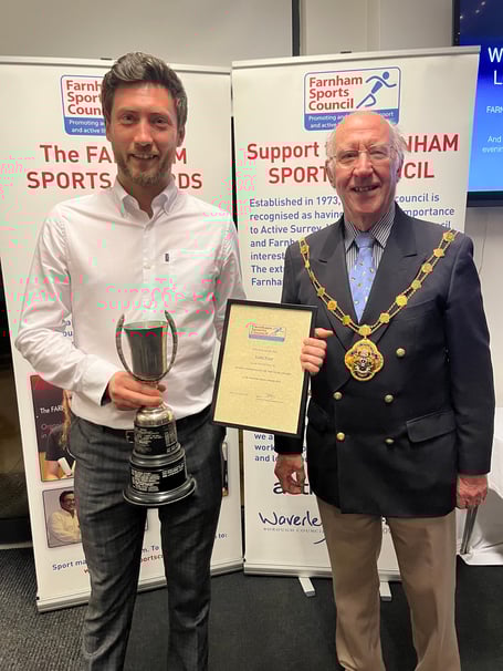 Luke Bone receives Lottie Woad's award on her behalf