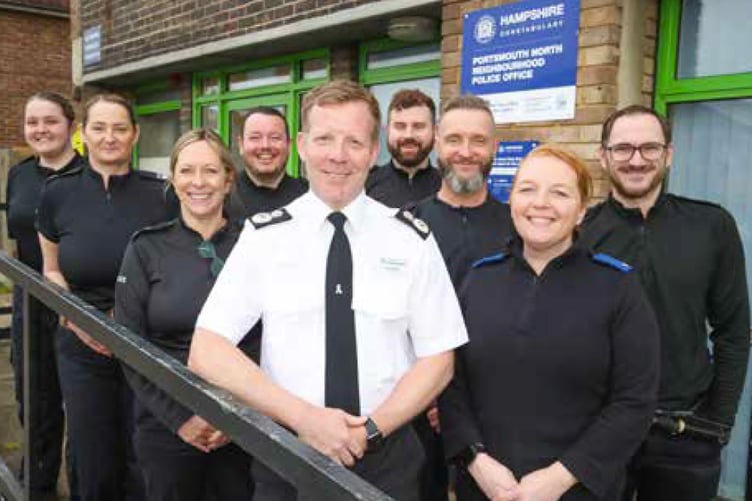Hampshire and Isle of Wight Constabulary chief constable Scott Chilton (white shirt), February 2023.