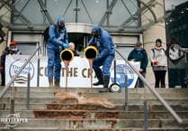 ‘Sewage’ poured outside Thames Water headquarters by XR rebels