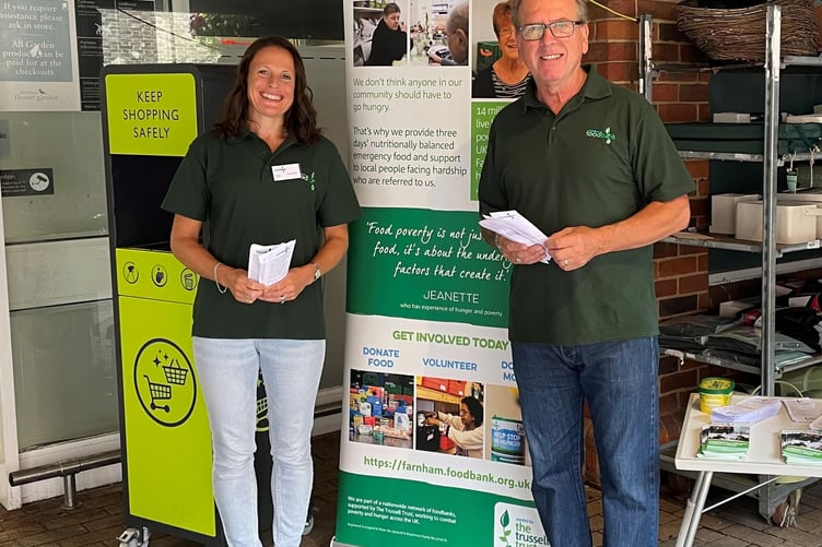 Farnham Foodbank volunteers Annette and Steve at a previous collection outside Waitrose in Lion & Lamb Yard