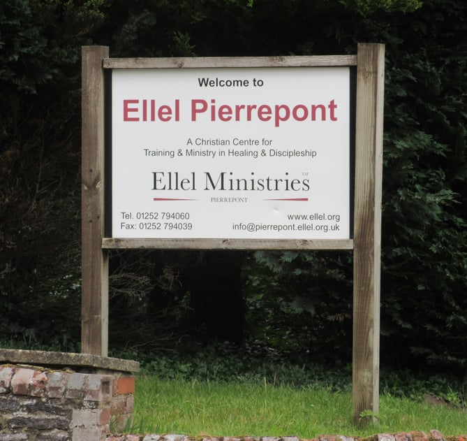 A sign at the entrance to Pierrepont House off Frensham Road