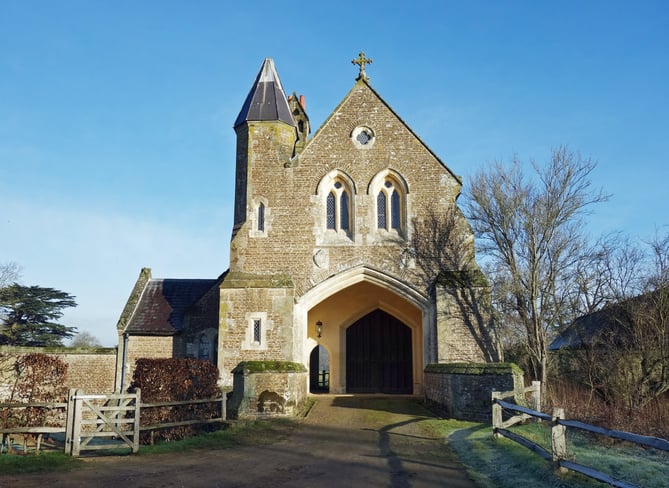 Oxenford gatehouse, part of the group of buildings at Oxenford Grange designed for Viscount Midleton of Peper Harow by Augustus Pugin, master of the Victorian Gothic style and architect of the Palace of Westminster and Big Ben amongst other notable buildings