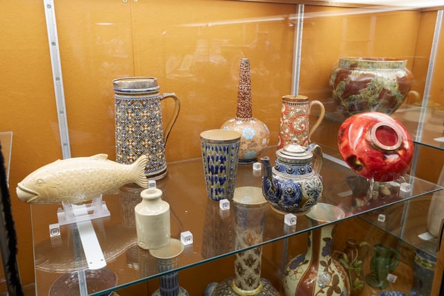 Researchers looking at ceramics collection at Allen Gallery in Alton