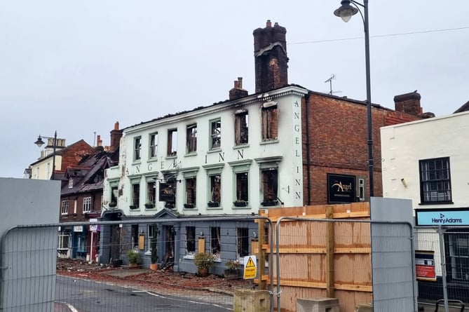 Fourteen fire engines tackled the blaze at The Angel Inn in Midhurst and more than 30 people, including a number of Ukrainian refugees, were evacuated from the building