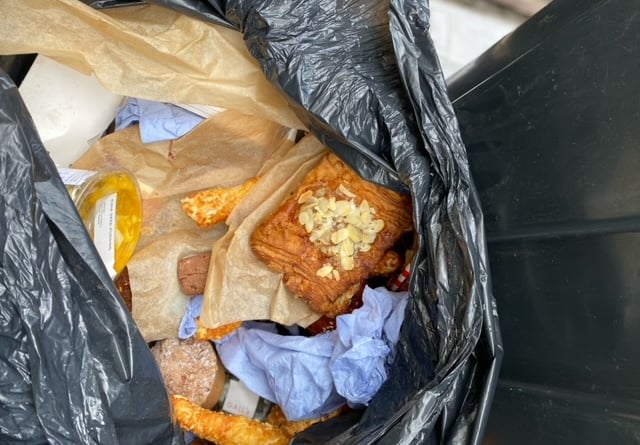 Debbie Flowerday counted eight black bin-liners full of bread and pastries outside of Gail's Bakery in Farnham