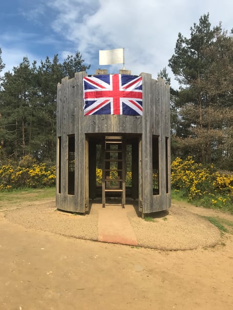 Union Flag on play area fort at Hogmoor Inclosure in Bordon for coronation, May 6th 2023.