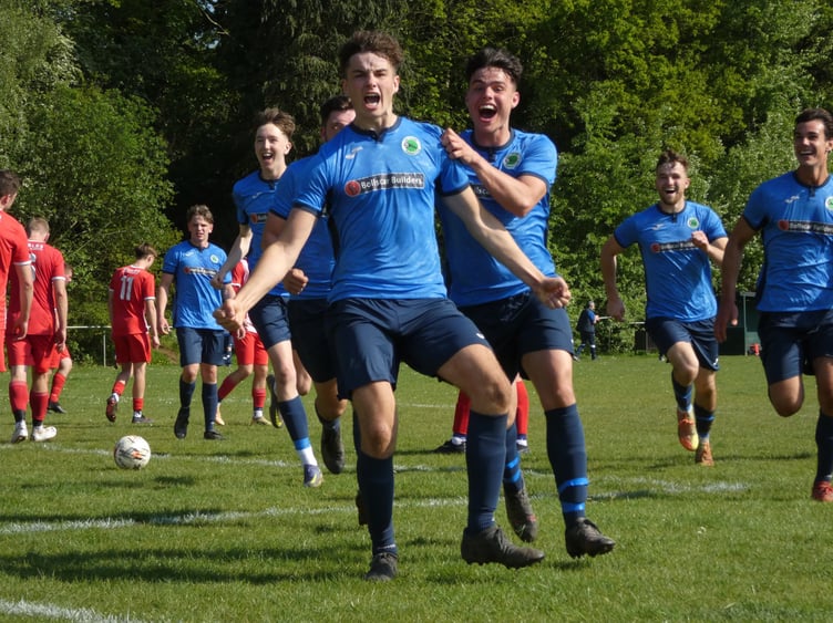 Dan Clark celebrates after scoring against Colden Common