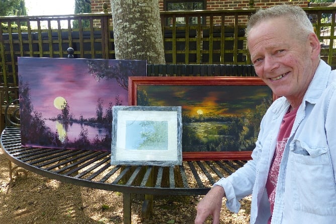 Jezz with some of his paintings, May 2023.