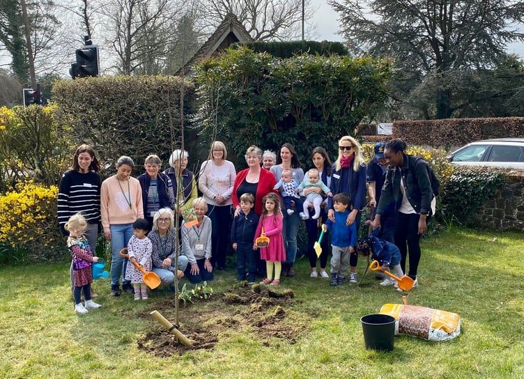 Members of the St Stephen’s Shottermill congregation planting a tree as part of the Queen’s Green Canopy project