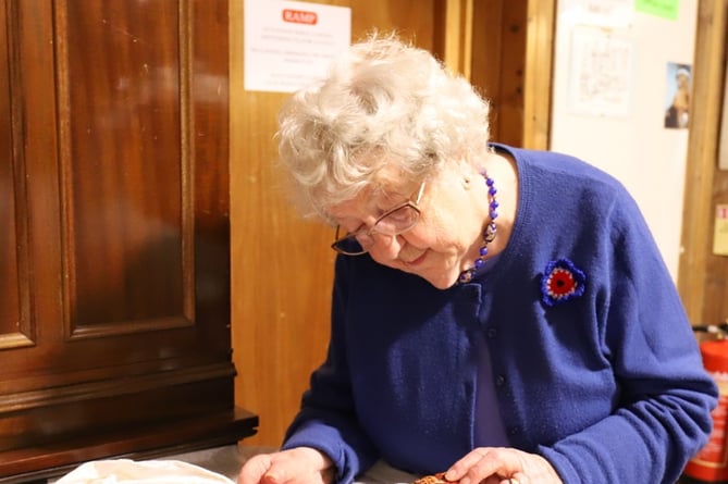 91-year-old Freda working on Haslemere Museum's textiles collection
