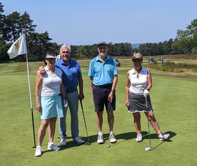 Hindhead golf club Winning Team just coming off the 18th hole. Captain of Hindhead Geoff Sullivan second from the left.