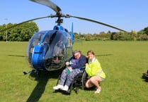 Disabled Woodlarks campers enjoy helicopter flights to Tilford