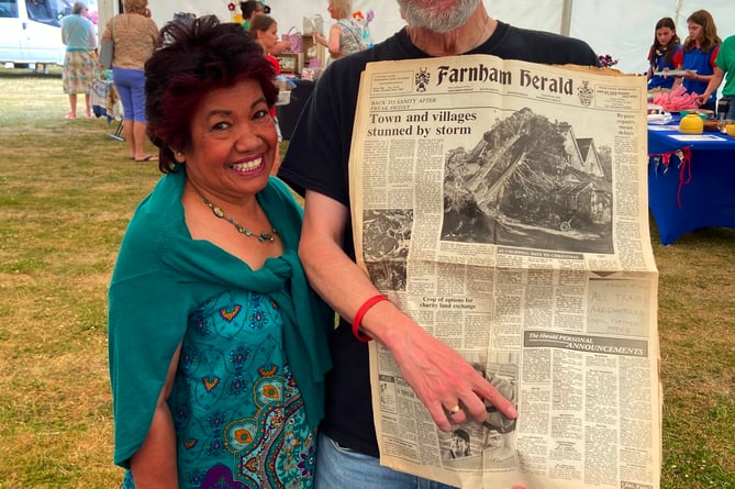Tim and Zenny Penycate with a copy of the Farnham Herald's 1987 'Great Storm' edition