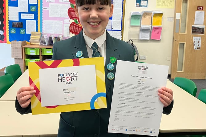 Eggar’s School pupil Clara with her Poetry by Heart judges’ feedback and certificate, June 2023.