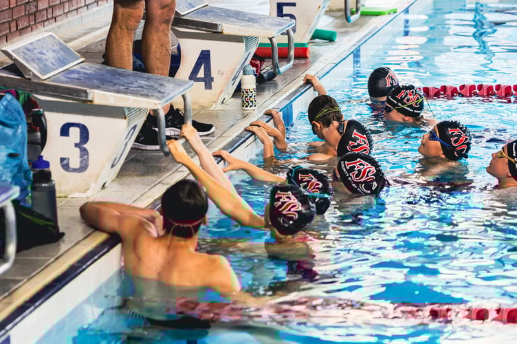 GB Olympic swimmer Mark Foster leads a swimming class at Farnham Leisure Centre