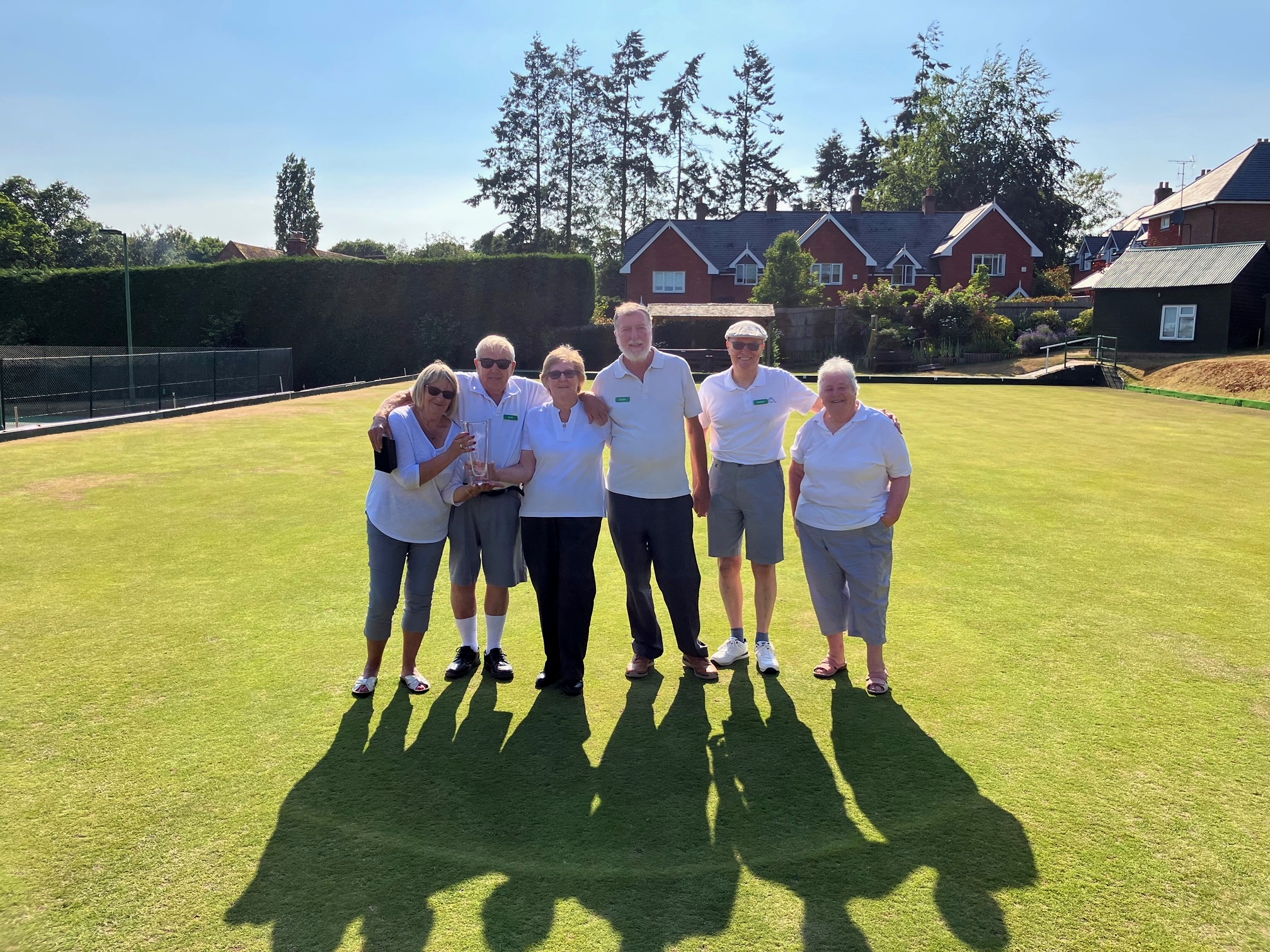 Winners Sue Haw, Bert Pharo and Jean Wiltshire with the trophy and beaten finalists Geoff Quick, Roger Pearce and Wendy Edwards