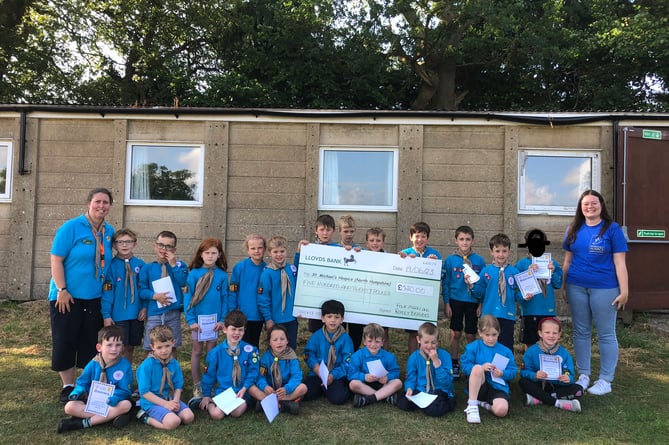 Lynn Vine, left, Louise Gough and the Four Marks and Ropley Willows Beavers, Four Marks Recreation Ground, July 2023.