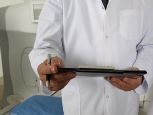Surrey man urges people to use bowel cancer test kit