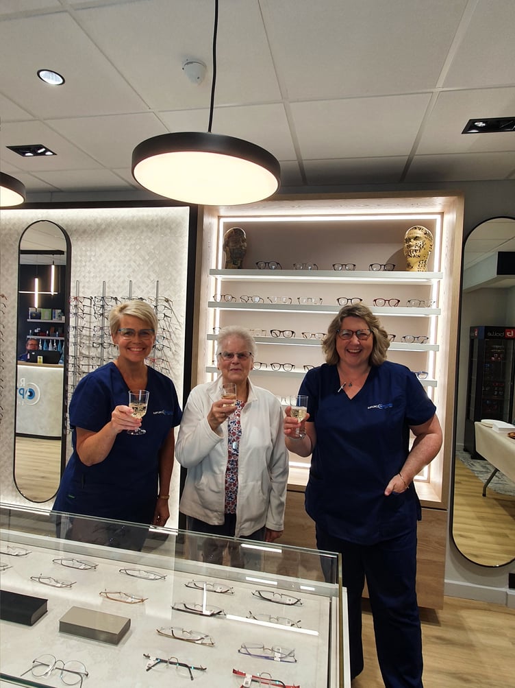 Rawlings staff raise a glass with customers after relocating to 43 High Street, Alton