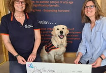 Dogs For Autism receives £2,255 from Styles and Associates of Alton