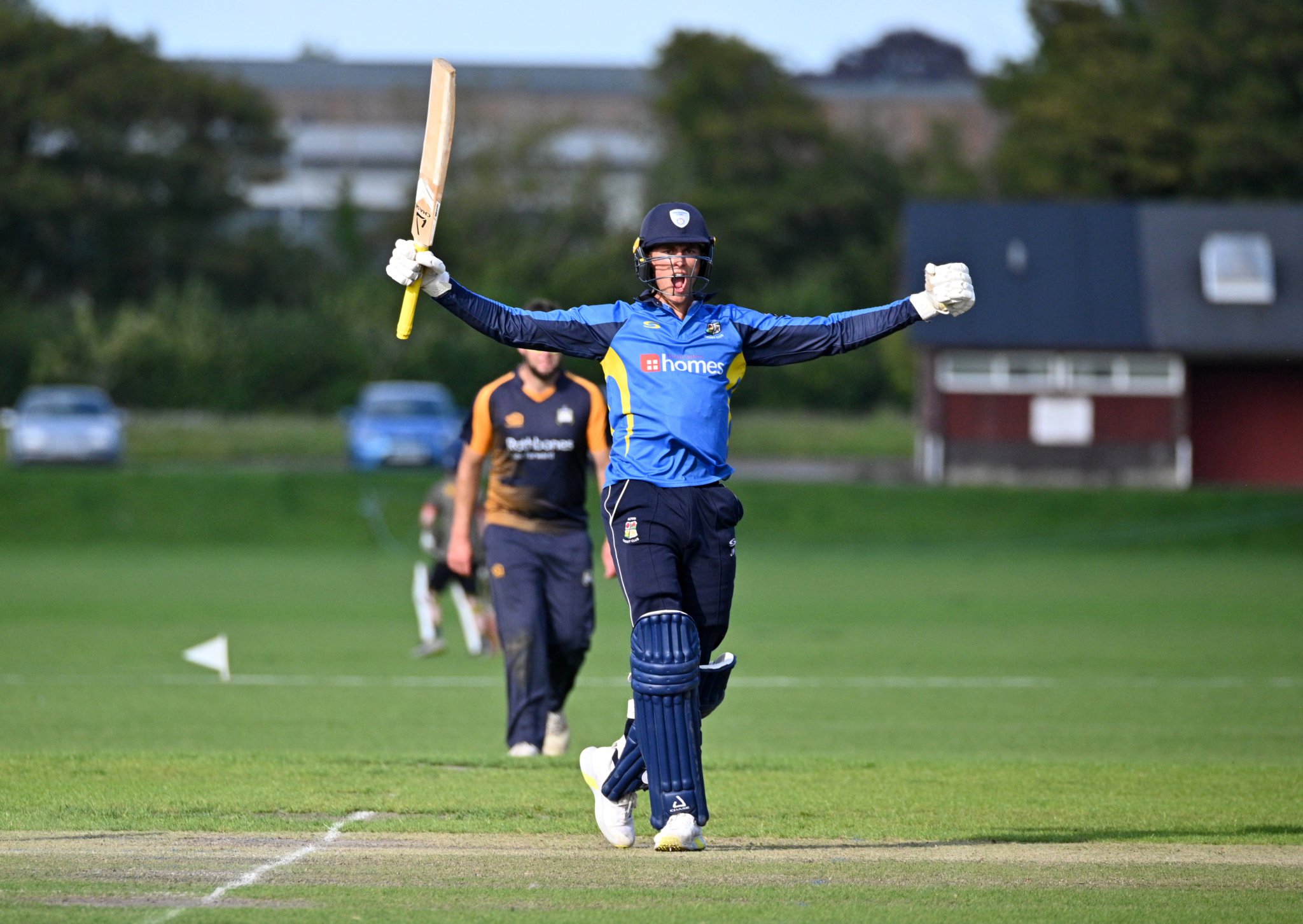 Jude Wright celebrates the winning runs after Alton beat Old Tauntonians & Romsey by eight wickets
