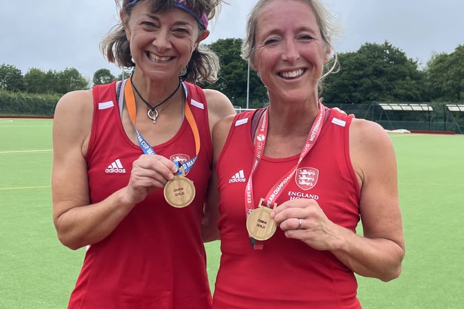 Haslemere Hockey Club team-mates Heidi Wells (left) and Mel Redman pictured with their gold medals