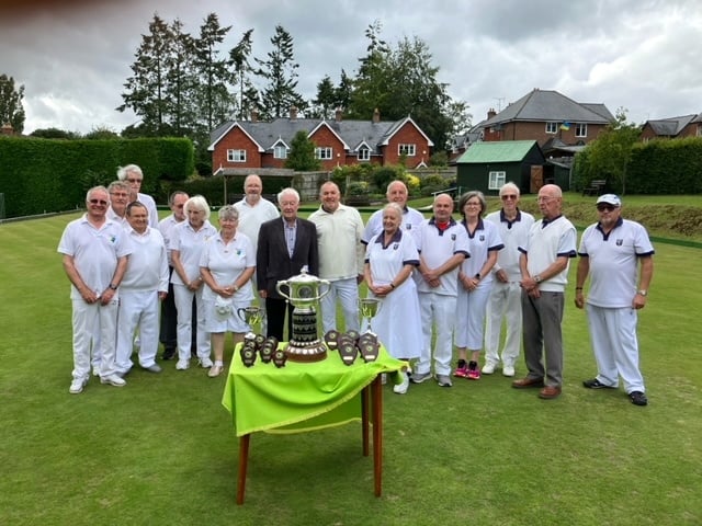 Organiser Ken Danson (centre) with the two Hunter Cup final teams