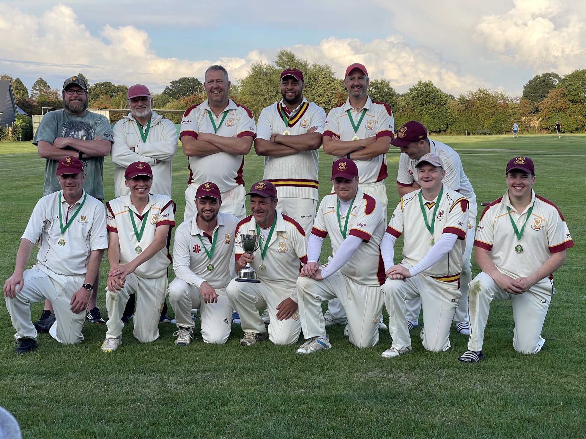 I’Anson Division Two champions Frimley are all smiles with the league trophy