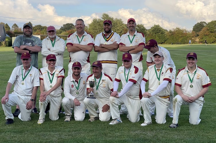 I’Anson Division Two champions Frimley are all smiles with the league trophy