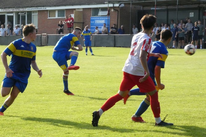 Tommy Tierney fires home Petersfield’s seventh goal