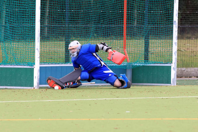 Goalkeeper Hamish Hall saves a penalty flick