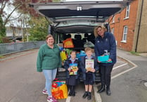 Alton School gives harvest festival donations to Alton food bank 