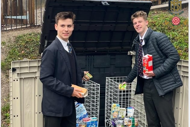 More House students Rufus and James with the Frensham school's new Farnham Foodbank collection point
