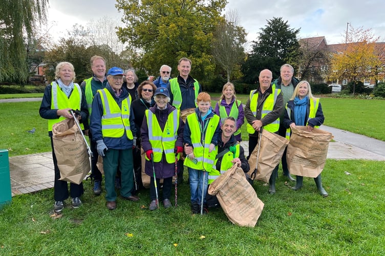 Chancellor Jeremy Hunt (centre) with Farnham and Bordon candidate Greg Stafford (second from left) and fellow litter pickers