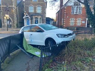 VIDEO: Car crashes into Farnham town centre barriers after hitting ice