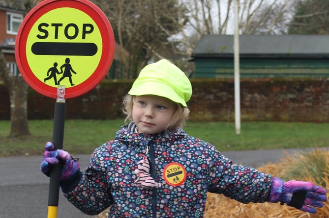 Andrews' Endowed CE Primary School pupil as lollipop lady, January 2024.
